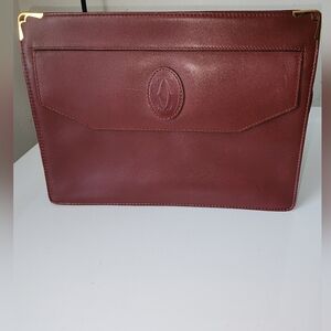Cartier Burgundy Leather Clutch with Gold Accents